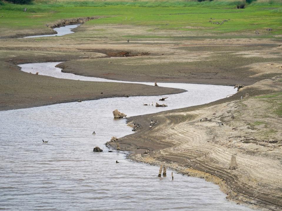 A view of low water levels at Roadford Lake in Devon (Andrew Matthews/PA)