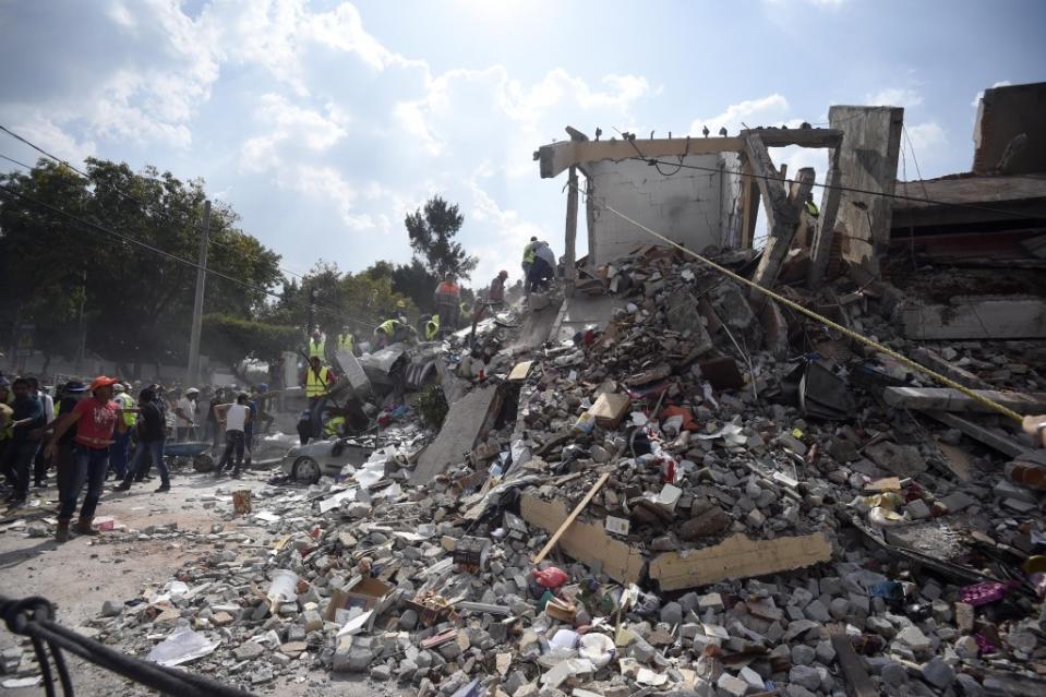 More than 200 have been killed and many more are still trapped in the rubble.