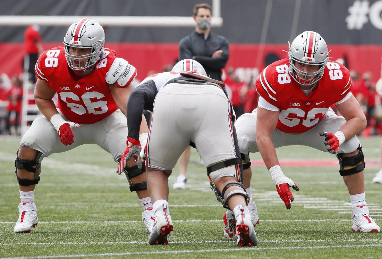 Team Brutus offensive guard Enokk Vimahi (66) and offensive guard Ryan Jacoby (68) block during the Ohio State Buckeyes football spring game at Ohio Stadium in Columbus on Saturday, April 17, 2021. 