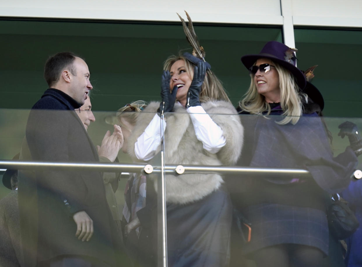 Matt Hancock and Carol Vorderman react in the stands during the Close Brothers Mares' Hurdle on day one of the Cheltenham Festival at Cheltenham Racecourse. Picture date: Tuesday March 14, 2023. (Photo by Andrew Matthews/PA Images via Getty Images)