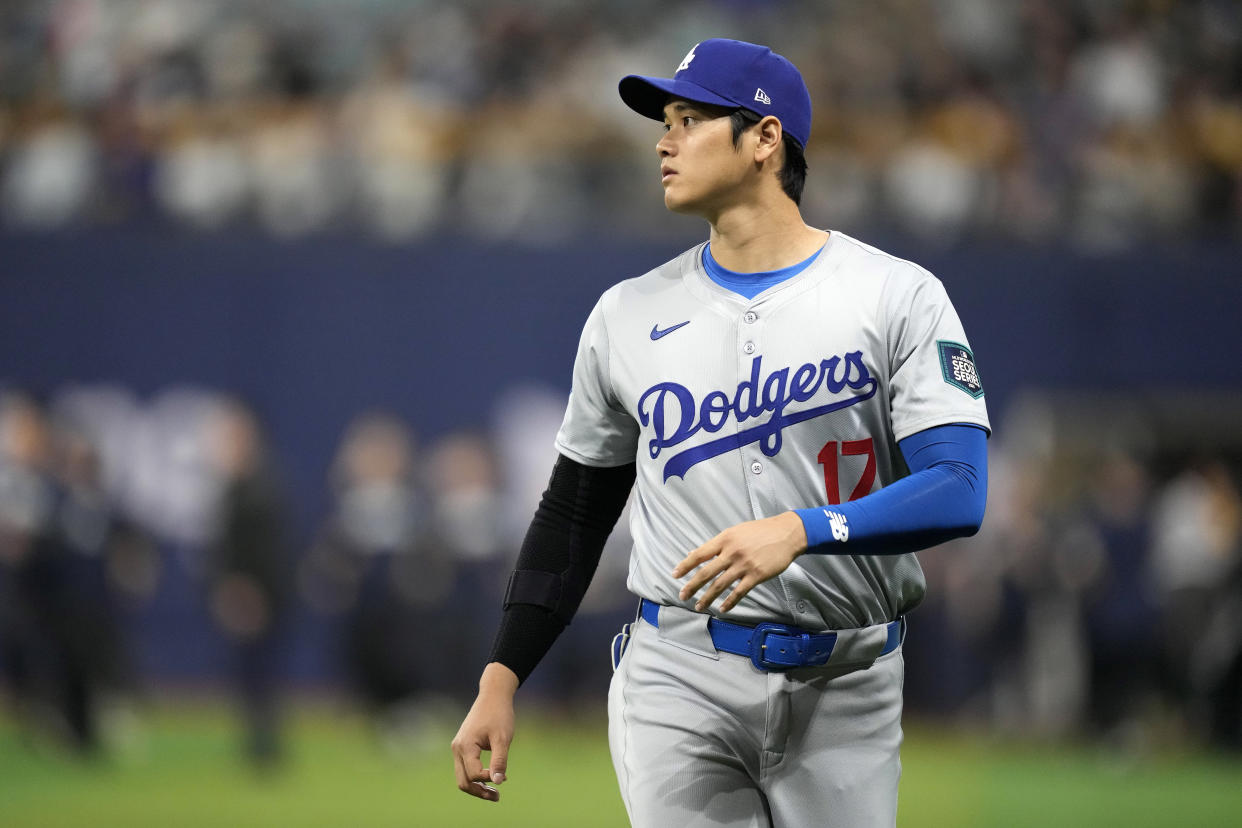 Los Angeles Dodgers designated hitter Shohei Ohtani warms up prior to an opening day baseball game against the San Diego Padres at the Gocheok Sky Dome in Seoul, South Korea Wednesday, March 20, 2024, in Seoul, South Korea. (AP Photo/Lee Jin-man)