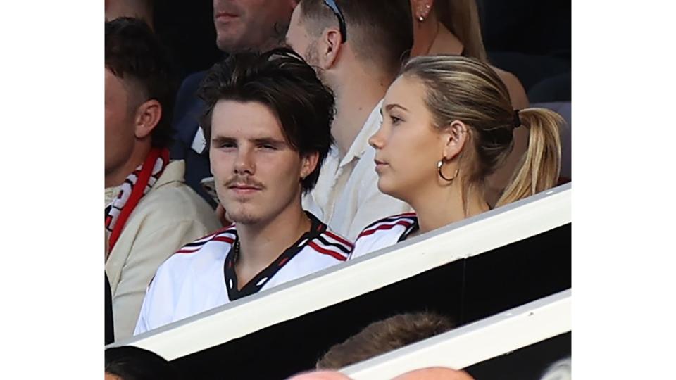 Cruz watched from the director's box during the Premier League match between Manchester United and Fulham FC with girlfriend Tana