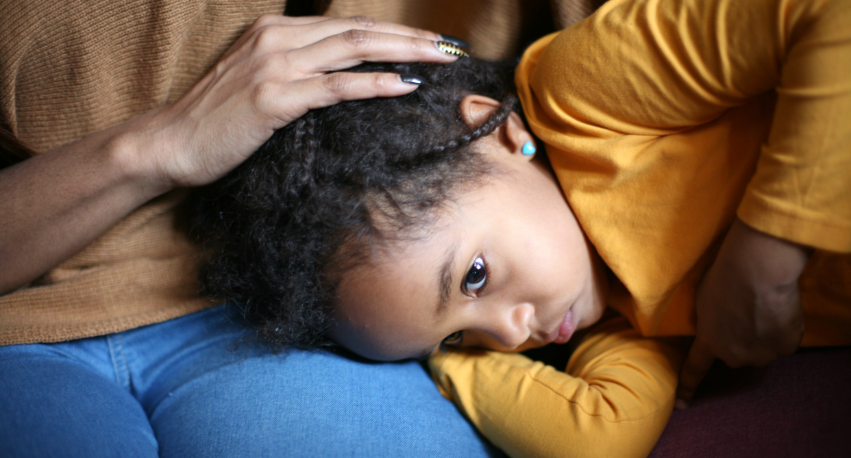 Working moms share how they're missing work — and worrying about career setbacks — to care for sick children amid a grueling tripledemic. (Photo: Getty)