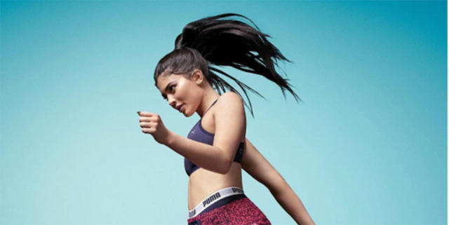 Kylie Jenner bares some skin in hotpants and sports bra for Puma