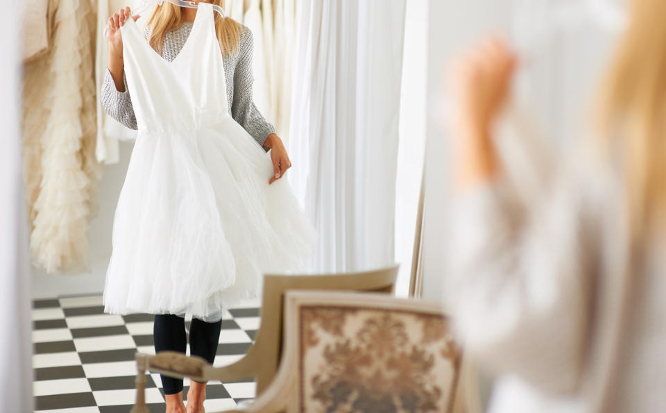 Can wedding guests ever wear white? It’s controversial. (Photo: Getty Images)