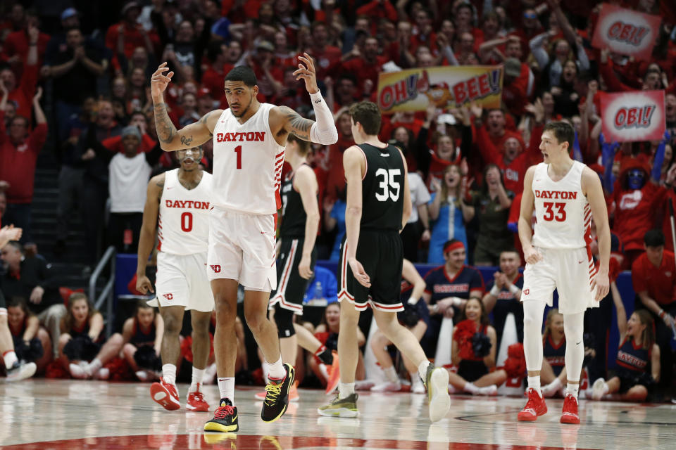 Dayton forward Obi Toppin (1) reacts to the crowd after a dunk against Davidson during the second half of an NCAA college basketball game Friday, Feb. 28, 2020, in Dayton, Ohio. Dayton won 82-67. (AP Photo/Gary Landers)