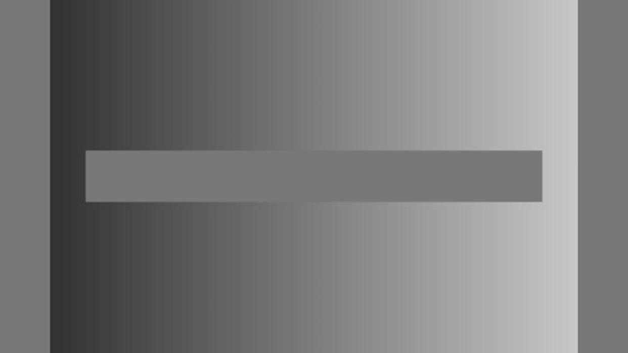  Multiple shades of grey in a gradient-like background with a single gray bar in the middle 