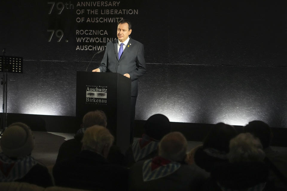 Israel's ambassador to Poland Yacov Livne speaks during a ceremony at the Birkenau Nazi death camp in Oswiecim, Poland, Saturday, Jan. 27, 2024. Survivors of Nazi death camps marked the 79th anniversary of the liberation of the Auschwitz-Birkenau camp during World War II in a modest ceremony in southern Poland.(AP Photo/Czarek Sokolowski)