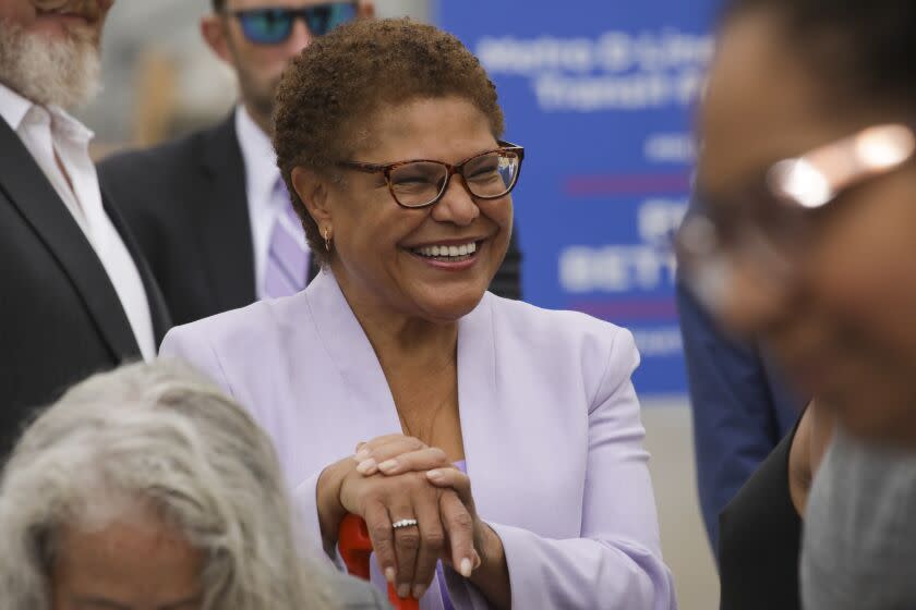 Los Angeles, CA - October 13: Los Angeles mayoral candidate Rep. Karen Bass at a press conference addressed by President Joe Biden at the construction site for the future terminus of the Metro D (Purple) Line near the West Los Angeles VA Campus on Thursday, Oct. 13, 2022 in Los Angeles, CA. (Irfan Khan / Los Angeles Times)