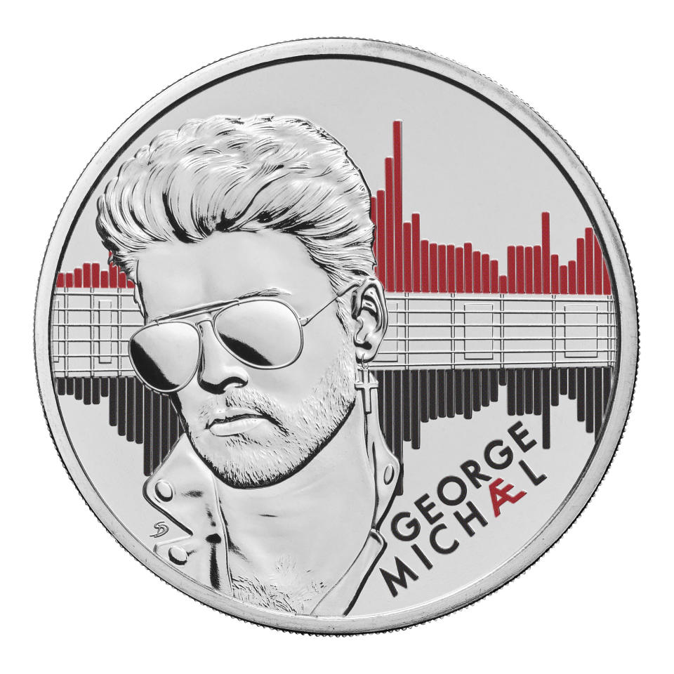 In this photo provided by the Royal Mint on Monday, Feb. 26, 2024, a view of a 5 sterling pound Brilliant Uncirculated George Michael Coin. A commemorative coin celebrating recording artist George Michel has been unveiled on Monday ranging in price from a pile of change to a small fortune as the late musician continues to rack up posthumous hits and honors. The coins with stamps by the Royal Mint depict Michael’s likeness in trademark aviator-style sunglasses, his blow-dried locks and five o’clock shadow he sported in the video for “Faith.” (The Royal Mint via AP)