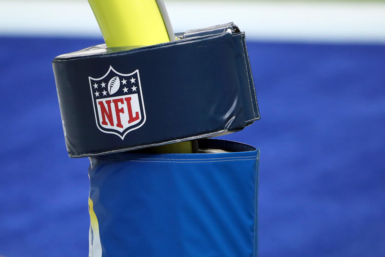 NFL logo on field goal post. 