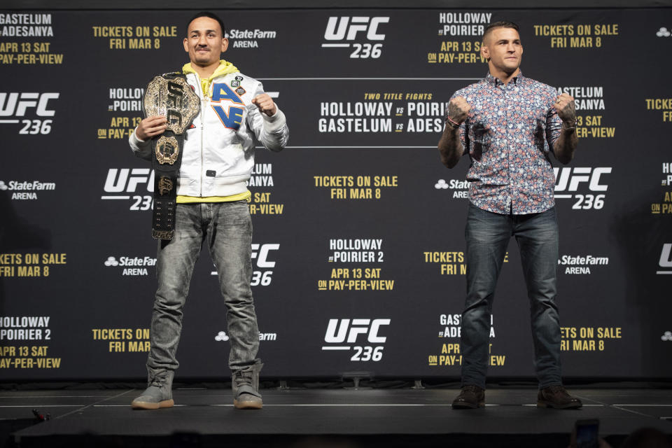 LAS VEGAS, NV - MARCH 01: UFC featherweight Champion Max Holloway, left, and Dustin Poirier during the UFC 236 press conference at the  T-Mobile Arena in Las Vegas, NV, Friday, Mar. 1, 2019. They will fight for the interim UFC lightweight championship. (Photo by Hans Gutknecht/MediaNews Group/Los Angeles Daily News via Getty Images)