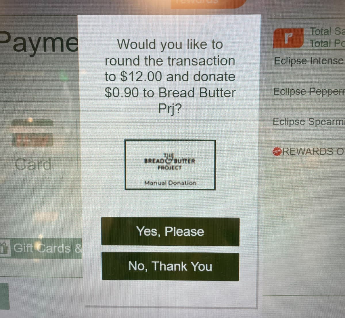 Alert for charity donation request on Woolworths self-serve checkout screen