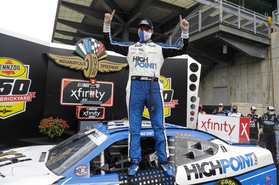 NASCAR Xfinity Series driver Chase Briscoe celebrates winning the NASCAR Xfinity Series auto race at Indianapolis Motor Speedway in Indianapolis, Saturday, July 4, 2020. (AP Photo/Darron Cummings)