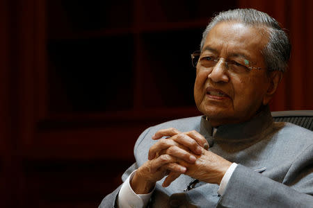 Malaysia's Prime Minister Mahathir Mohamad speaks during an interview with Reuters in Putrajaya, Malaysia June 19, 2018. REUTERS/Lai Seng Sin