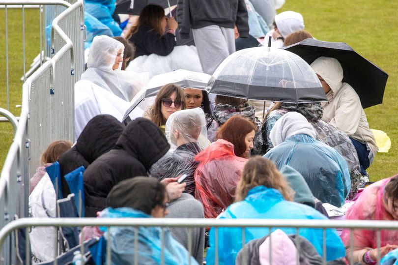 Taylor Swift fans brave the cold, wind and rain as they queue for the singers first UK night of her The Eras Tour at Murrayfield in Edinburgh. June 7 2024.