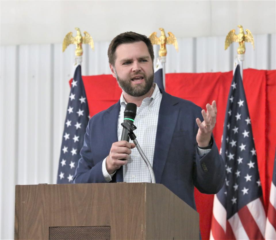 Republican U.S. Sen. J.D. Vance speaks to a crowd in rural Clyde.