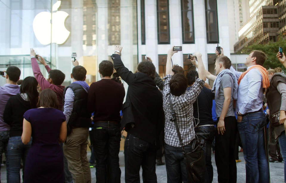 Like the versions before it, the iPhone 5—"the thinnest, lightest, fastest iPhone" since, well, the last one—drove plenty of obsession among Apple fans. Preorders of the iPhone 5 sold out in an hour. (Mario Tama/Getty Images)