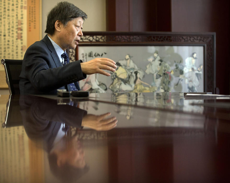 In this Friday, Feb. 24, 2017 photo, Haier CEO Zhang Ruimin speaks during an interview at the company's headquarters in Qingdao in eastern China's Shandong Province. Zhang built Haier from a failing refrigerator factory in the 1980s into the biggest maker of major appliances. Now, he is trying to transform a traditional manufacturer with 60,000 employees in 25 countries into a nimble, Internet Age seller of consumer goods and services from web-linked washing machines to food delivery. (AP Photo/Mark Schiefelbein)