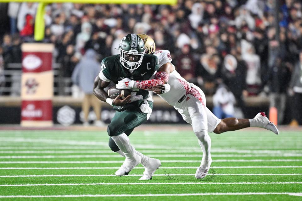 Michigan State Spartans running back Nate Carter gets tackled during the first half at Alumni Stadium on Saturday, Sept. 21, 2024, in Chestnut Hill, Massachusetts. Carter finished with just 9 yards on nine carries in MSU's 23-19 loss. Eric Canha, Eric Canha-Imagn Images