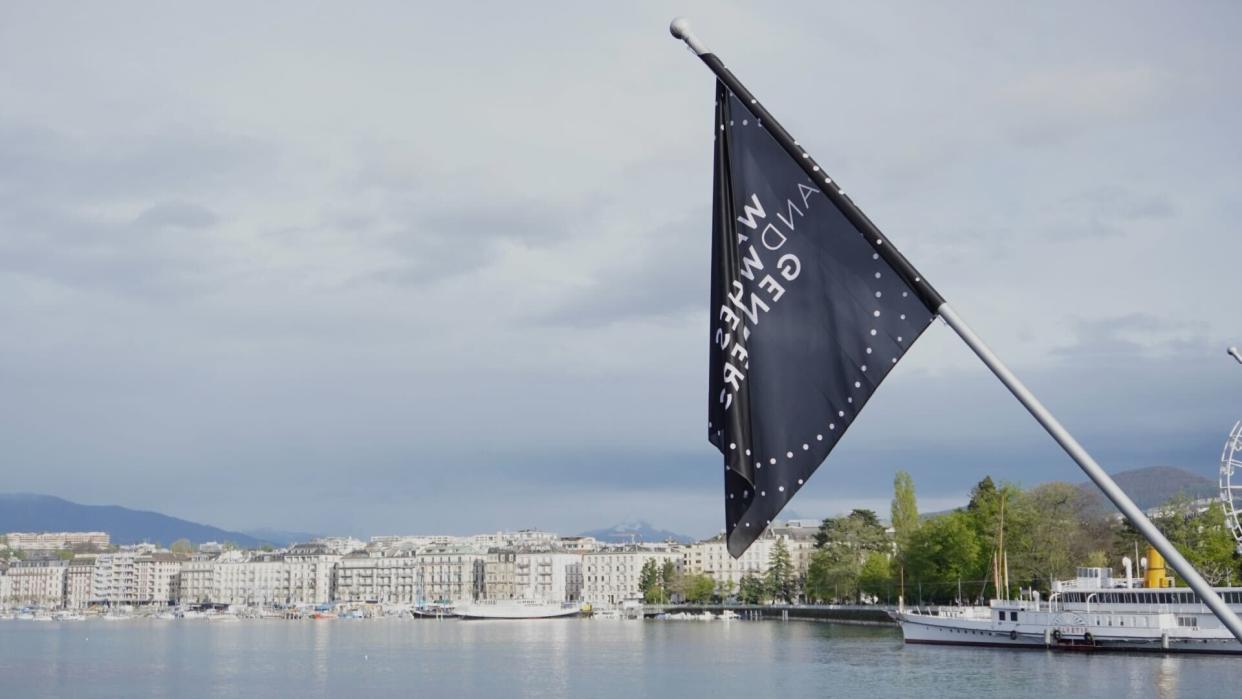  The Watches and Wonders 2024 flag over the Geneva skyline. 