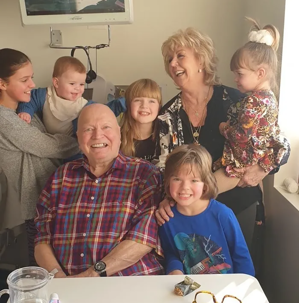 Bert and Patti Newton in the hospital with their grandchildren.