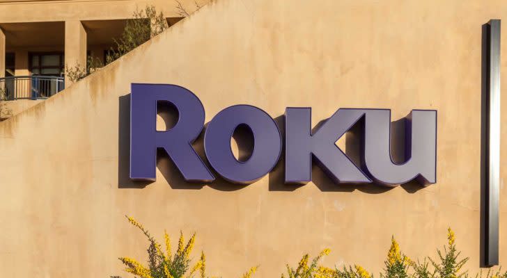 A purple Roku sign is pictured on a wall in Los Gatos, California.