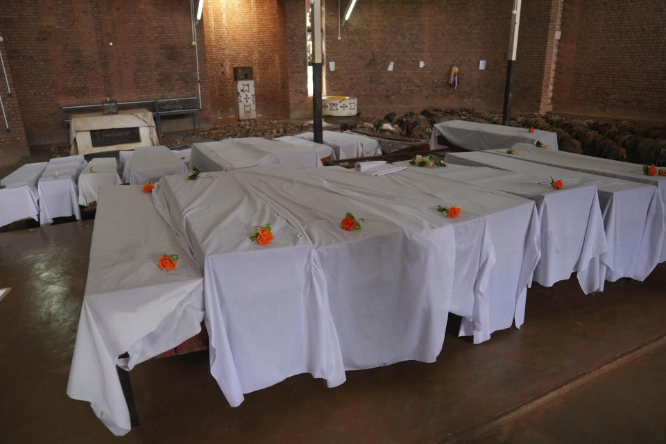 Coffins containing newly discovered remains of victims of the 1994 genocide arranged before a funeral ceremony inside a Catholic church, in Nyamata, Rwanda, Friday, April 5, 2024. An estimated 800,000 Tutsis were killed by extremist Hutus in massacres that lasted over 100 days in 1994. Some moderate Hutu who tried to protect members of the Tutsi minority were also targeted. (AP Photo/Brian Inganga)