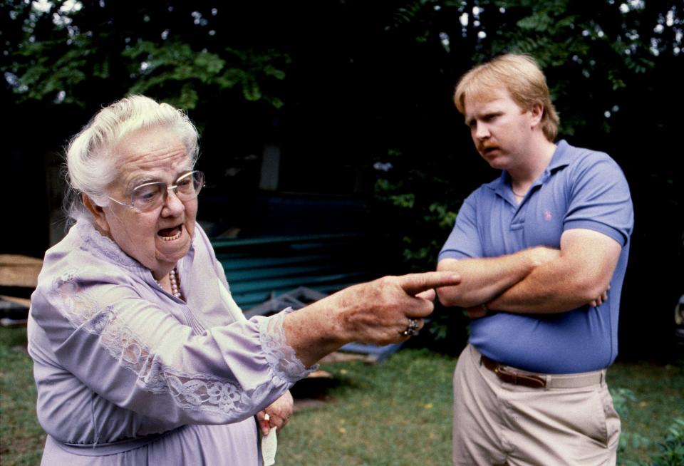 Fighting to save the house she owned at 1244 McGavock Pike, East Nashville landlord Carrie Sissom, left, gives Metro Codes inspector Billy Deering an earful to no avail July 13, 1990. The razing was the end of a two-year battle over codes violations.