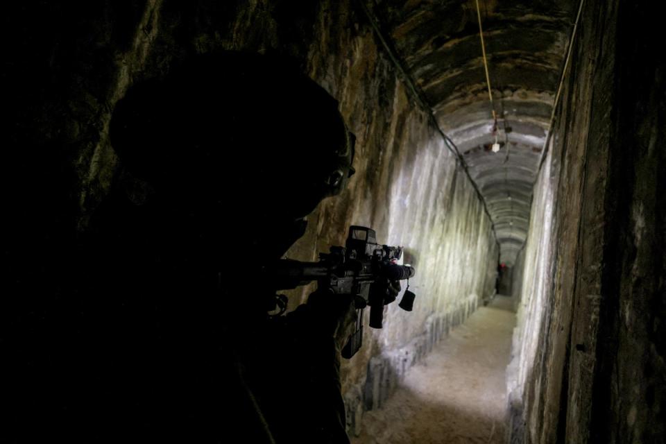 An Israeli soldier secures a tunnel underneath Al Shifa Hospital in Gaza City (REUTERS)