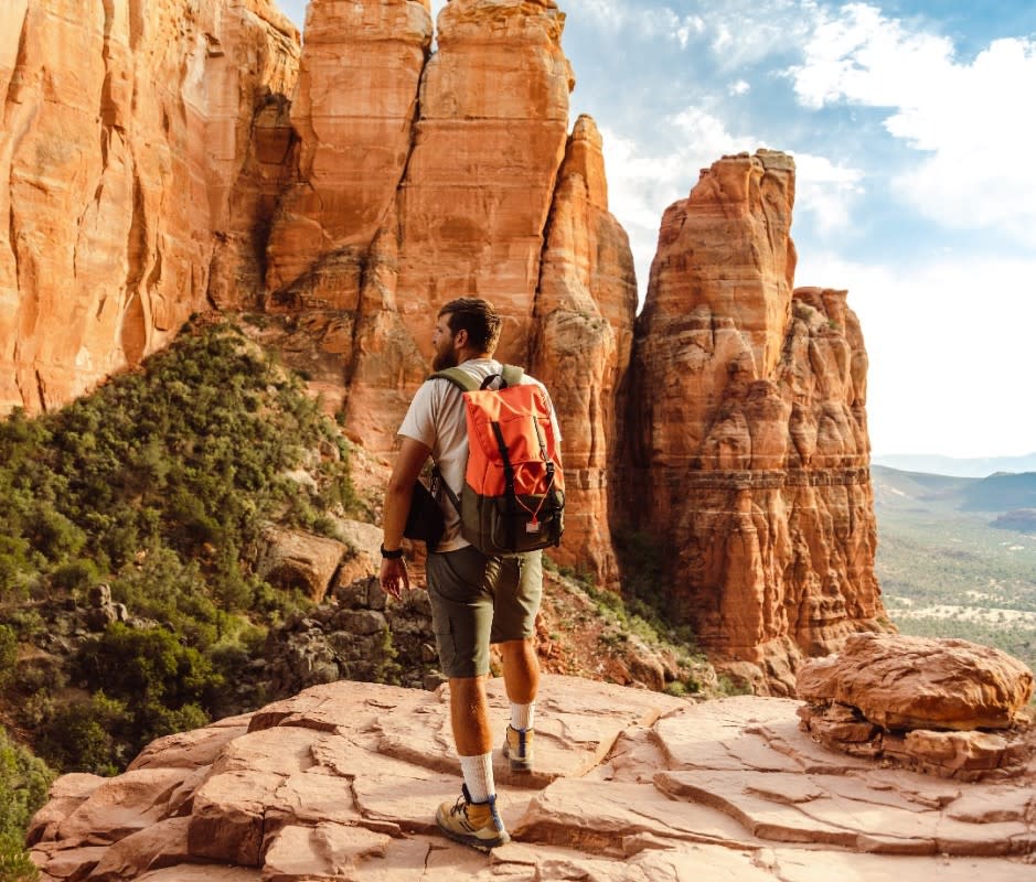 Sedona's 400-plus miles of hiking trails provide closeup views of the area's famous red rock canyons, cliffs, and buttes.<p>blackCAT/Getty</p>