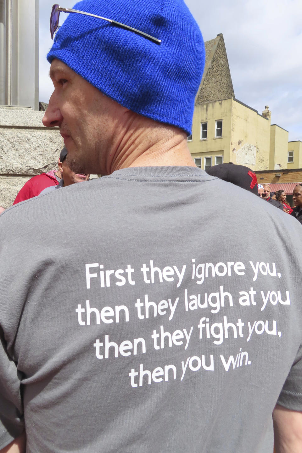 Ray Jensen Jr., assistant director of the United Auto Workers Region 9 office, shows his T-shirt during an anti-smoking rally in Trenton N.J. on April 5, 2024. A national anti-smoking group and a Michigan health system are enlisting shareholders of major gambling companies including Boyd Gaming, Bally's, and Caesars Entertainment to push the companies to study the financial effects of eliminating smoking in their casinos. (AP Photo/Wayne Parry)