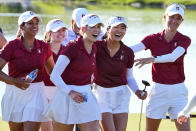 Stanford golfers celebrate with Rose Zhang, center right, after she won the NCAA college women's golf championship at Grayhawk Golf Club, Monday, May 22, 2023, in Scottsdale, Ariz. (AP Photo/Matt York)