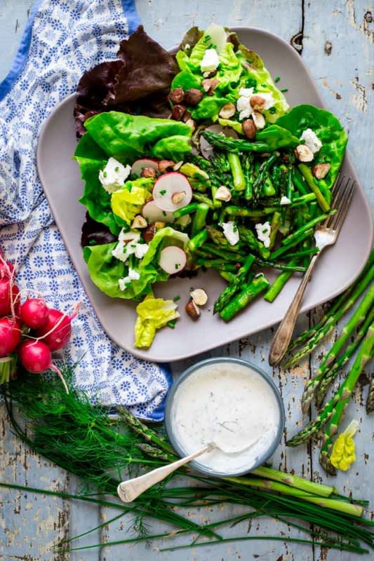 <p>Healthy Seasonal Recipes</p><p>A healthy lunch on its own or perfect to serve alongside your main course. </p><p><strong>Get the recipe: <a href="https://www.healthyseasonalrecipes.com/roasted-asparagus-and-goat-cheese-salad/" rel="nofollow noopener" target="_blank" data-ylk="slk:Roasted Asparagus Salad with Goat Cheese;elm:context_link;itc:0;sec:content-canvas" class="link rapid-noclick-resp">Roasted Asparagus Salad with Goat Cheese</a> </strong></p>