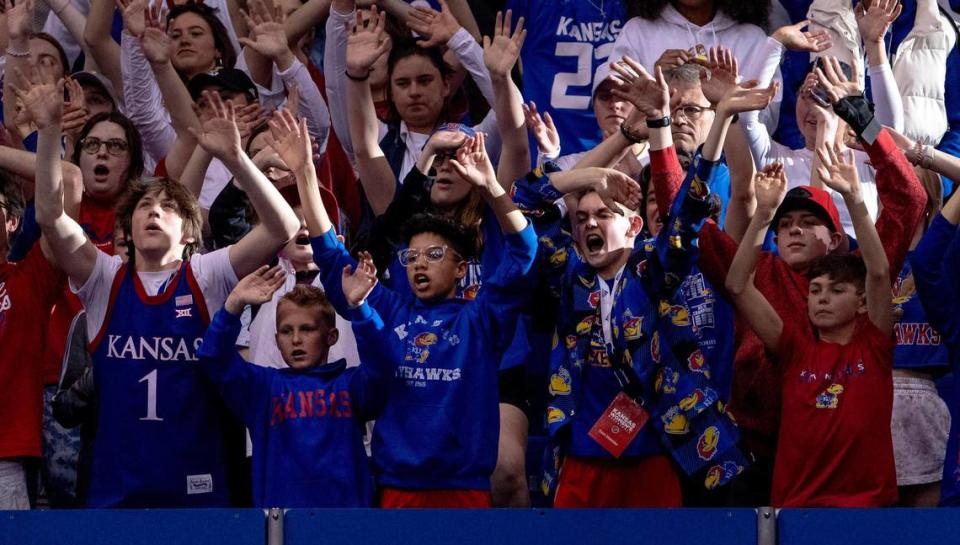Kansas fans make noise as a Columbia player shoots free throws during the second half of an NCAA college basketball game in the final of the WNIT, Saturday, April 1, 2023, in Lawrence, Kan.