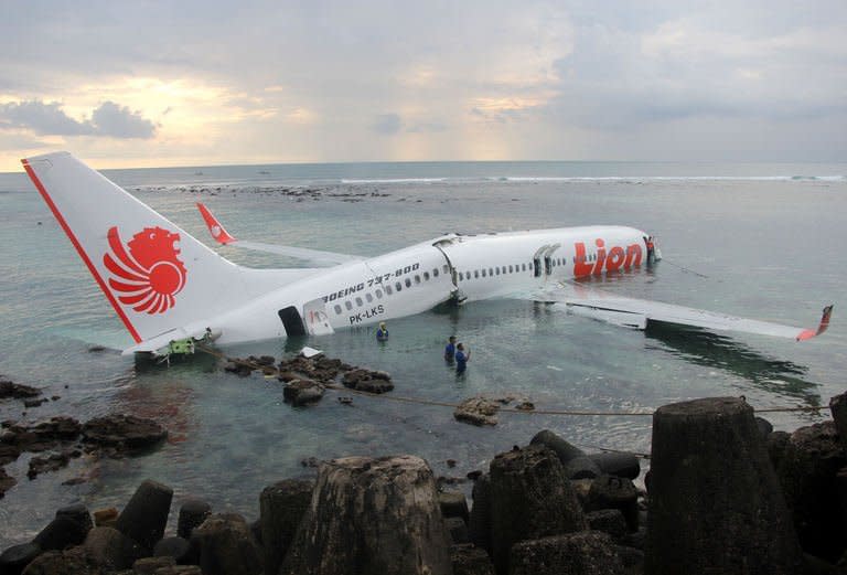 The Lion Air Boeing 737 lying in the water near Bali's Denpasar airport on Saturday. The dramatic crash of a Lion Air plane into the sea off Bali has raised fears Indonesia's fastest-growing carrier may be putting passenger safety at risk with its huge expansion plans, analysts said Sunday