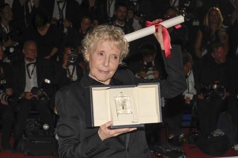 Claire Denis, winner of the grand prize for 'Stars at Noon,' poses for photographers during the photo call following the awards ceremony at the 75th international film festival, Cannes, southern France, Saturday, May 28, 2022. (AP Photo/Petros Giannakouris)