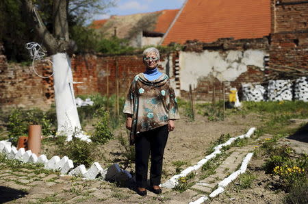 Verica Martinovic, 55, who said she was raped during the 1991-95 war of independence from Yugoslavia, poses for a picture in Vukovar, east Croatia, April 19, 2015. REUTERS/Antonio Bronic