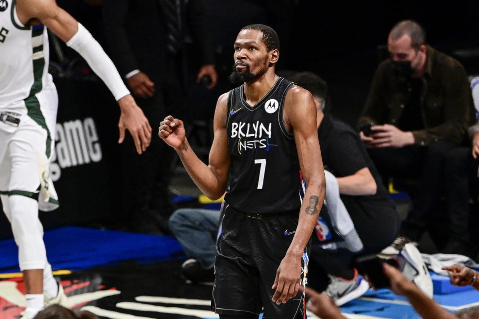 Kevin Durant #7 of the Brooklyn Nets celebrates against the Milwaukee Bucks in Game Five of the Second Round of the 2021 NBA Playoffs at Barclays Center on June 15, 2021 in New York City. NOTE TO USER: User expressly acknowledges and agrees that, by downloading and or using this photograph, User is consenting to the terms and conditions of the Getty Images License Agreement. (Photo by Steven Ryan/Getty Images)