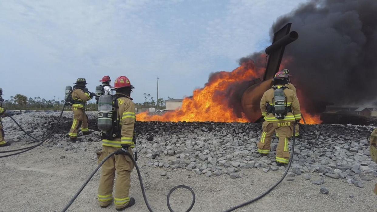 PHOTO: Firefighters at Tyndall Air Force Base near Panama City, Fla., practice putting out a fuel fire using new fluorine-free foam, or F3, which does not contain PFAS chemicals. (ABC News)
