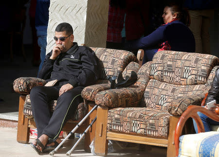 Christian families who left from Al-Arish city North Sinai’s Governorate capital after the escalation of a campaign targeting Christians by Islamic State militants last week, take a rest after arriving at the Saint Church in Ismailia, northeast of Cairo, Egypt February 27, 2017. Picture taken February 27, 2017. REUTERS/Amr Abdallah Dalsh