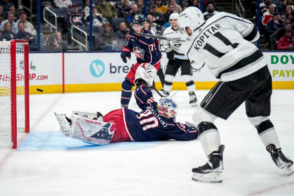 Dec 11, 2022; Columbus, Ohio, United States;  Los Angeles Kings center Anze Kopitar (11) scores during the second period of the NHL hockey game between the Columbus Blue Jackets and the Los Angeles Kings at Nationwide Arena. Mandatory Credit: Joseph Scheller-The Columbus Dispatch