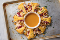 <p>Stuff all of your Thanksgiving leftovers — stuffing included — inside a giant crescent roll. </p><p><a href="https://www.delish.com/cooking/a22999141/thanksgiving-ring-recipe/" rel="nofollow noopener" target="_blank" data-ylk="slk:Get the recipe from Delish »;elm:context_link;itc:0;sec:content-canvas" class="link "><em>Get the recipe from Delish »</em></a></p>