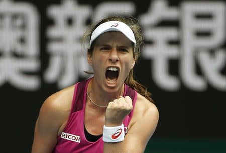 Britain's Johanna Konta celebrates winning the first set during her quarter-final match against China's Zhang Shuai at the Australian Open tennis tournament at Melbourne Park, Australia, January 27, 2016. REUTERS/Issei Kato