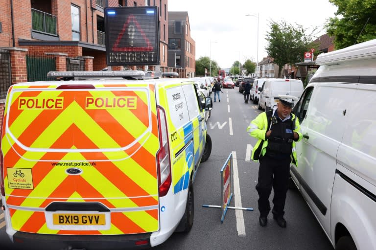 A 13-year-old boy was killed and four other people were injured by a man wielding a sword in Hainault, east London (Adrian DENNIS)