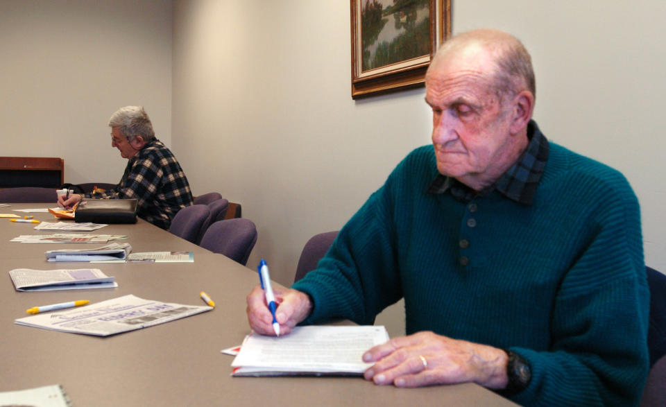 Staff Photo by Doug Jones, Thursday, May 11, 2006: Thomas Baldwin of Westbrook takes advantage of the last minute registration for Medicare Part D provided at the Southern Maine Agency on Aging.  (Photo by Doug Jones/Portland Press Herald via Getty Images)