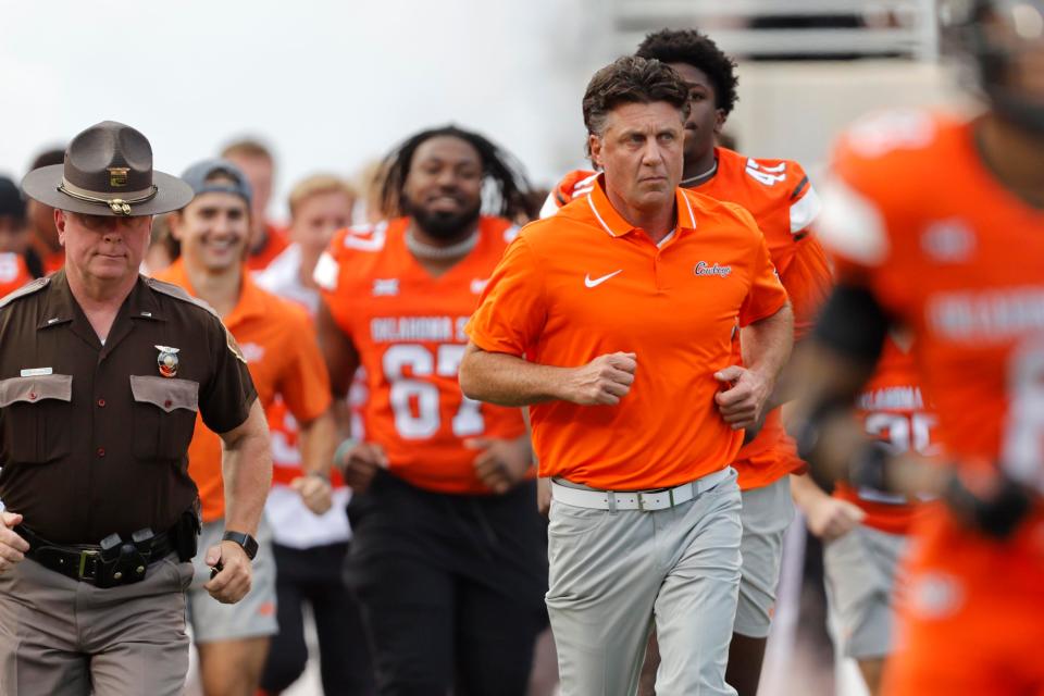 OSU coach Mike Gundy takes the field before Saturday's game against South Alabama at Boone Pickens Stadium in Stillwater. South Alabama won 33-7.