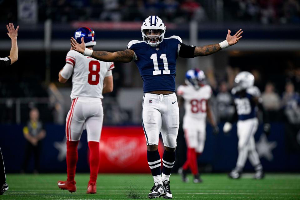Nov 24, 2022; Arlington, Texas, USA; Dallas Cowboys linebacker Micah Parsons (11) celebrates after he sacks New York Giants quarterback Daniel Jones (8) during the second half of the game between the Cowboys and the Giants at AT&T Stadium. Mandatory Credit: Jerome Miron-USA TODAY Sports