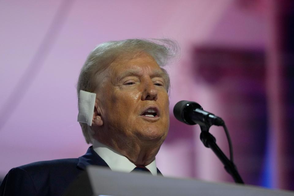 Republican presidential nominee Donald J. Trump is seen on stage during a walkthrough before the start of the third day of the Republican National Convention at Fiserv Forum. The third day of the RNC featured a feature on foreign policy and threats.