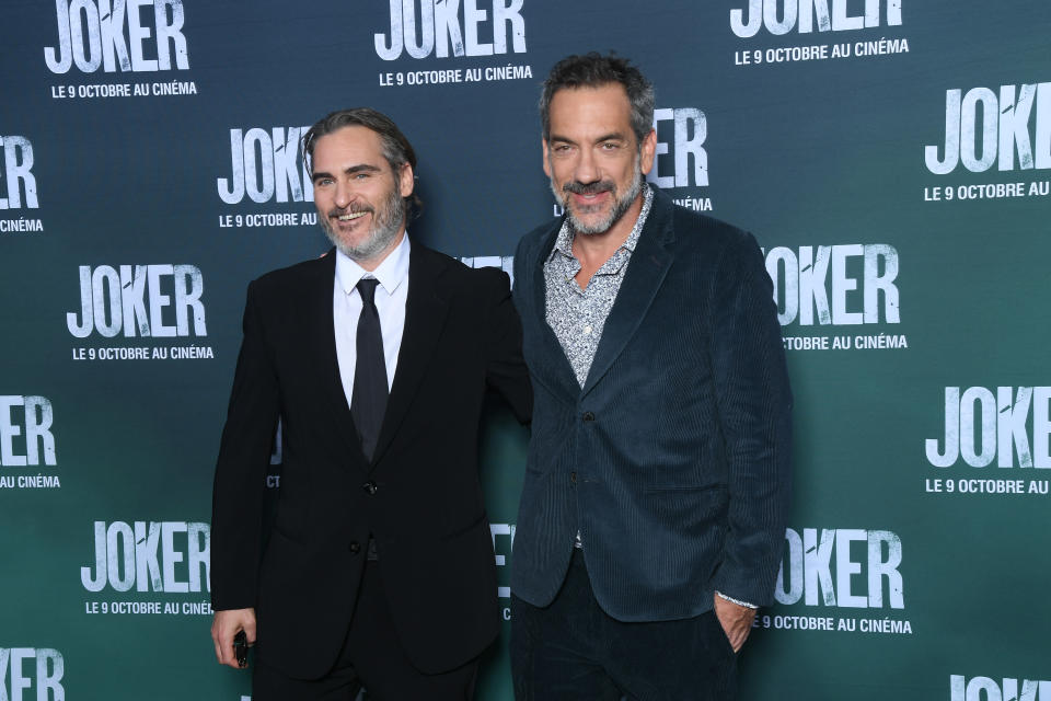 PARIS, FRANCE - SEPTEMBER 23: (L-R) Actor Joaquin Phoenix and Director Todd Phillips attend the 